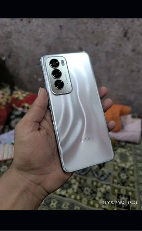 OPPO Reno 12 5g in brand new condition best phone in best price with a 2