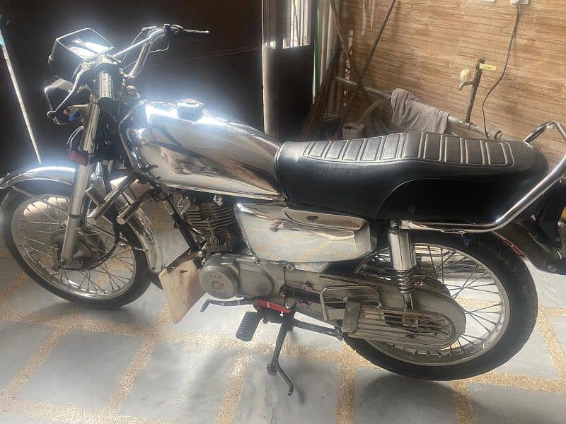 Honda 125 Pubjab no 21 Model 1