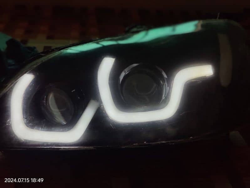 honda civic ES (2002,2003,2004) cateye customized headlights for sale 1