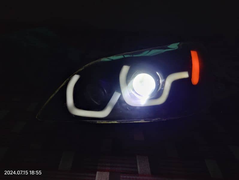 honda civic ES (2002,2003,2004) cateye customized headlights for sale 2