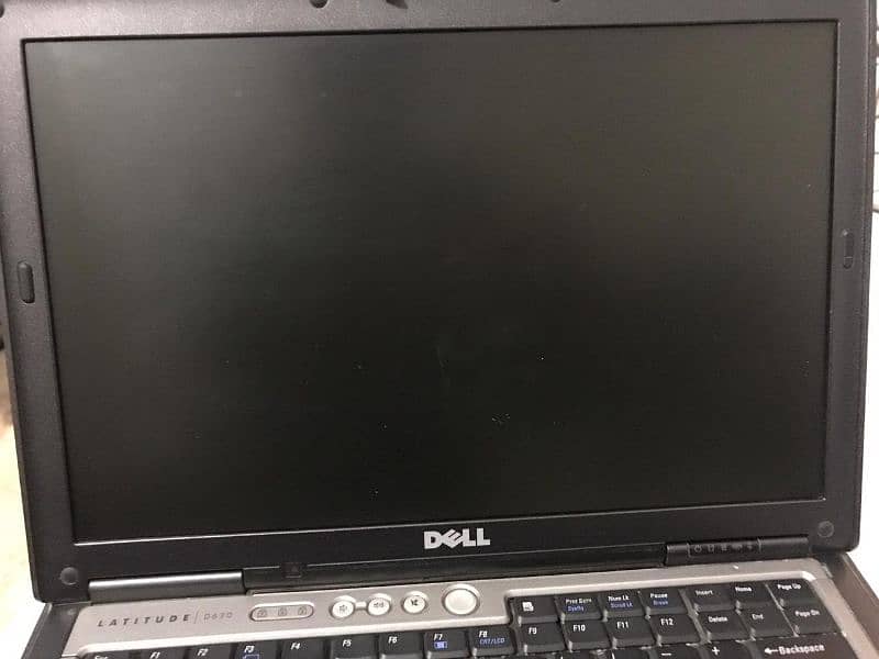 Dell D630 Core 2 Due (with Charger) 11