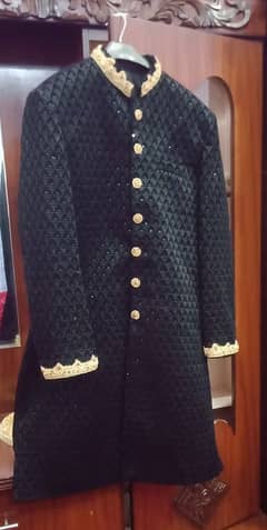 black sherwani mehroon combination