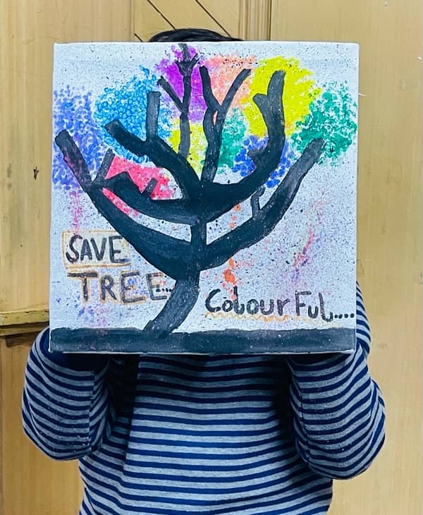 Painting of a colourful tree by school kid beautiful 1