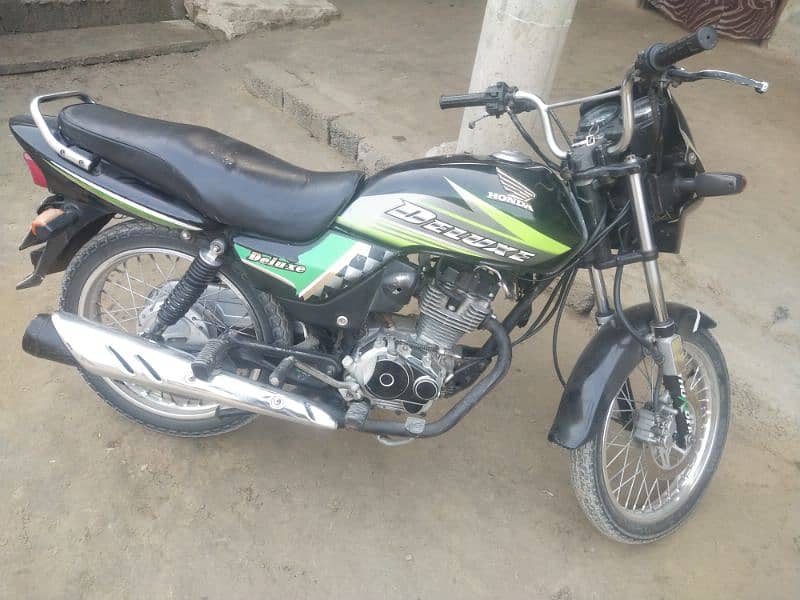 deluxe 125model 2011nowshera Nombar 0