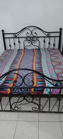 Rod Iron big size bed is available for sale