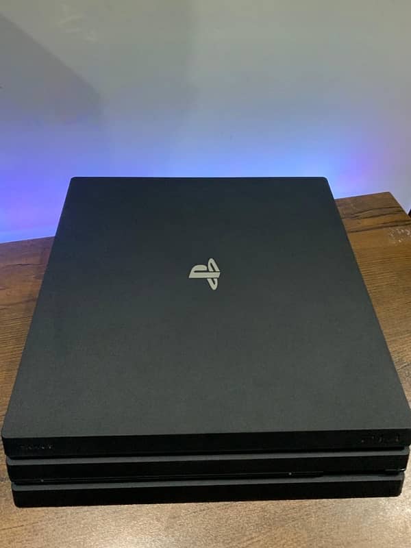 Ps4 Pro 1Tb with All Original Accessories Controllers and 3 CDs 3