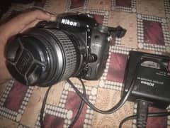 Nikon D7000 10/10 charger battery lence bage and balt