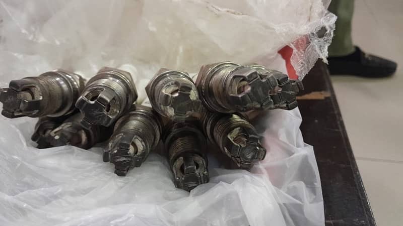 We purchased old, damaged,sacraped & used spark plugs of all gass 0