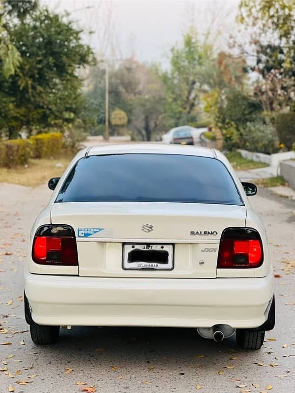 Suzuki Baleno 2005 White colour Islamabad number 1