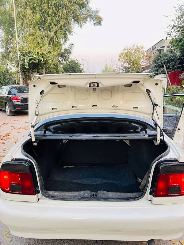 Suzuki Baleno 2005 White colour Islamabad number 12