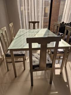 Brand new dinning table n six chairs foe sale. . price 140000