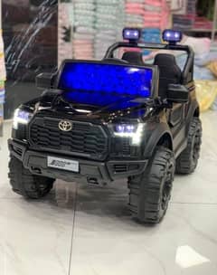 kids electric jeep/electric car/remote operated/ride on. 03264332199