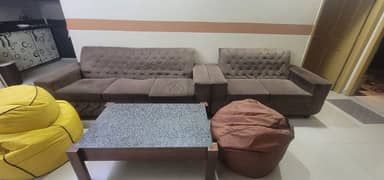 sofa set with wooden table and 2 bean bags