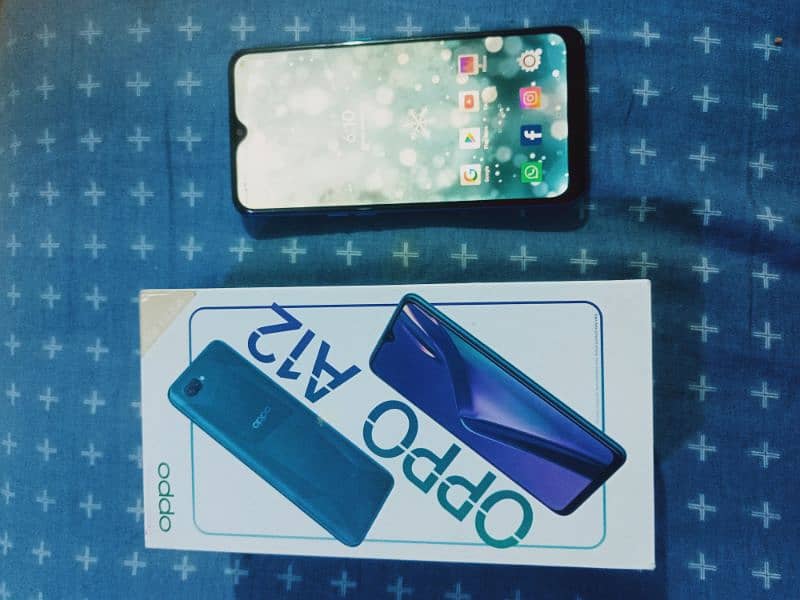 Oppo A12  3GB / 32 GB 4