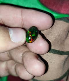 4.65 Carat Ethiopian black Opal Opal with full fires and all colors