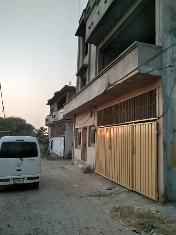 triple story house main gate gulshan abad 6