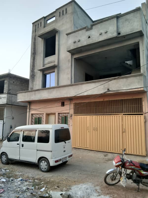 triple story house main gate gulshan abad 7