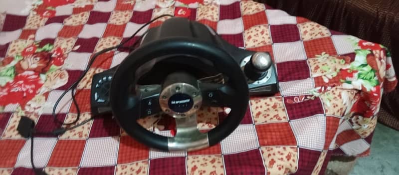 play station 3 jailbreak with controllers stearing wheelgood condition 2