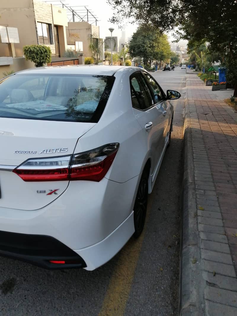 Toyota Corolla Altis Grande X 1.8 Beige Interior 2022 3