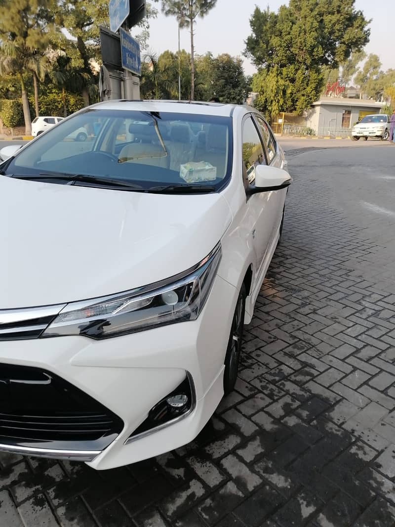 Toyota Corolla Altis Grande X 1.8 Beige Interior 2022 10