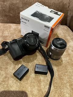 Sony 6100 with kit lens + 50mm 1.8 + Box