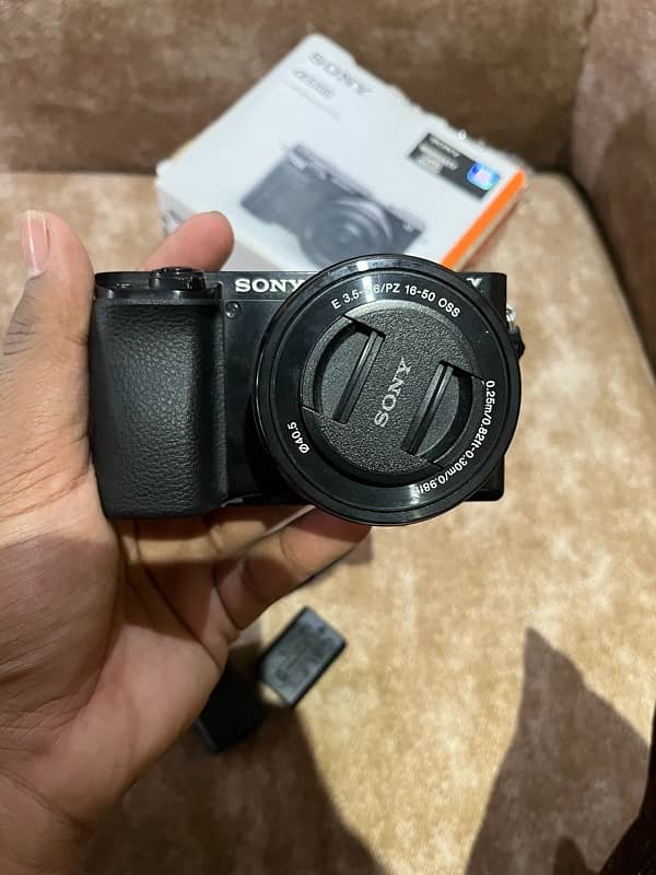 Sony 6100 with kit lens + 50mm 1.8 + Box 6