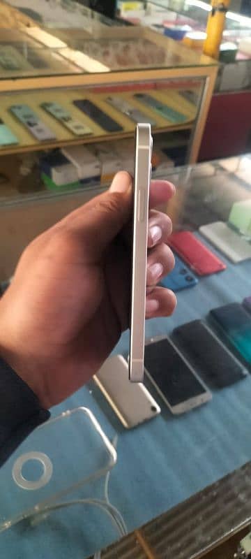 iPhone 12 NON PTA  Colour  white  Health 83 Memory 128 7