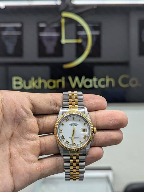 BUKHARI WATCH BUYER Rolex Date Just Omega Speed Master Cartier Longine 1