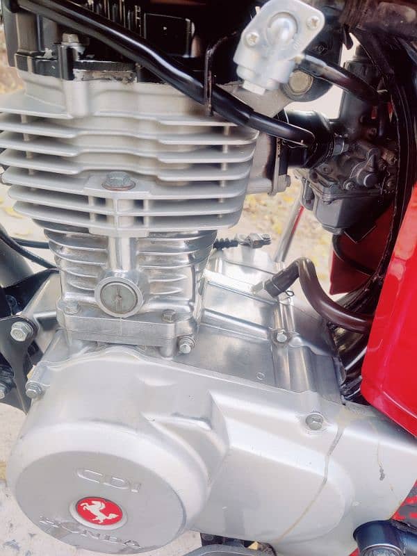 Honda 125 Rawalpindi number 2018 model on my name biomatric available 3