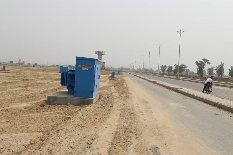 ONE KANAL PLOT M 410 ON 80FT ROAD NEAR PARK 1