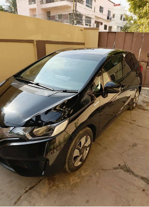 Honda Fit hybrid 2014 model registered 2018 1st owner car 2