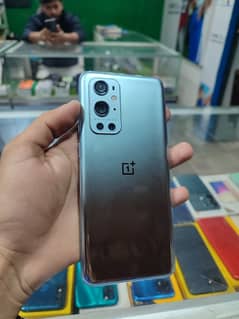 OnePlus 9pro approved all okay 10 by 10 minor dot