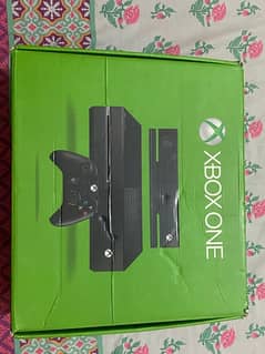 Xbox one along with one additional controller,charging kit and 4 games