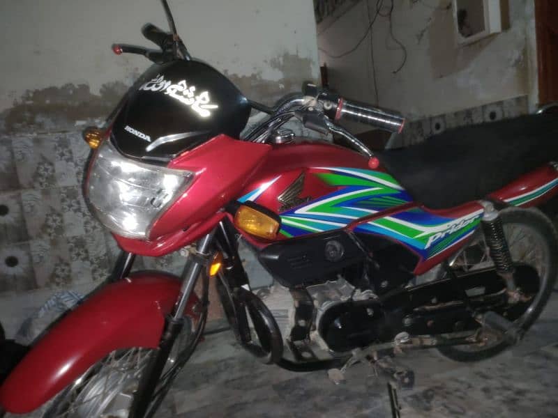 Honda 100 cc prider 1