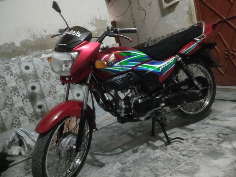 Honda 100 cc prider 3