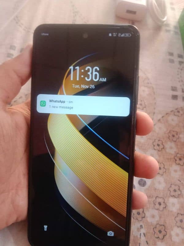 iam selling my Infinix smart 8 pro with box and charger and case 4