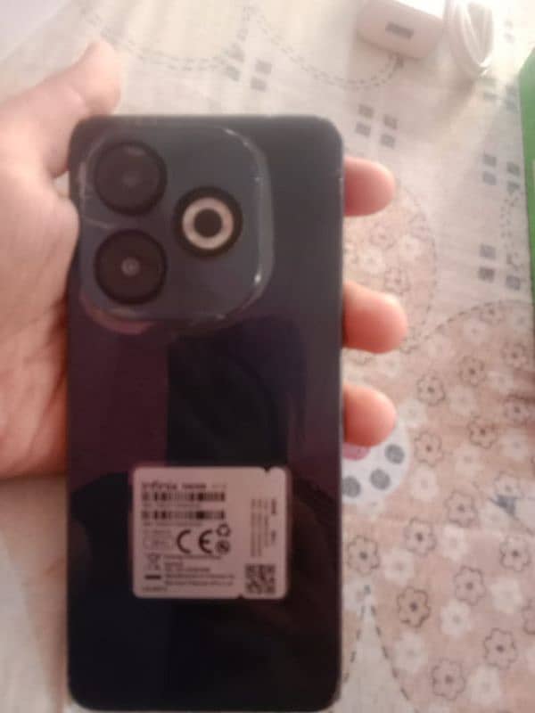 iam selling my Infinix smart 8 pro with box and charger and case 8