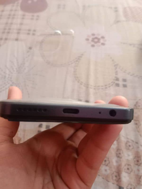 iam selling my Infinix smart 8 pro with box and charger and case 10