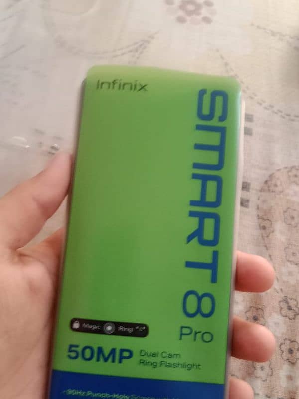 iam selling my Infinix smart 8 pro with box and charger and case 11