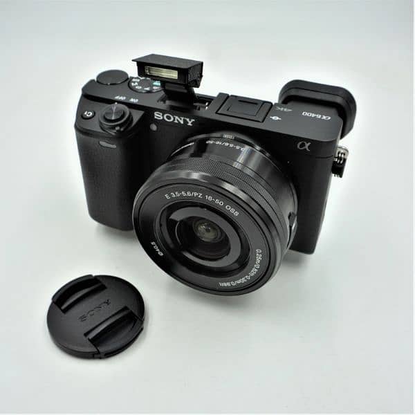 a 6400 mirror less camera with lens 1