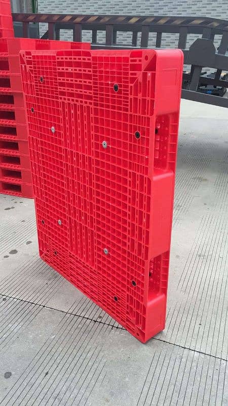 Plastic wooden pallets stock in Pakistan | Heavy duty storage pallets 0