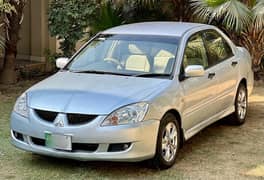 Mitsubishi Lancer GLX 1300cc Automatic 2004, excellent condition.