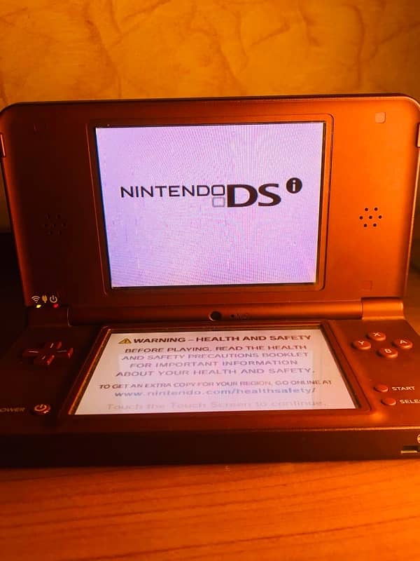 Nintendo DSi xl Mahroon colour 5