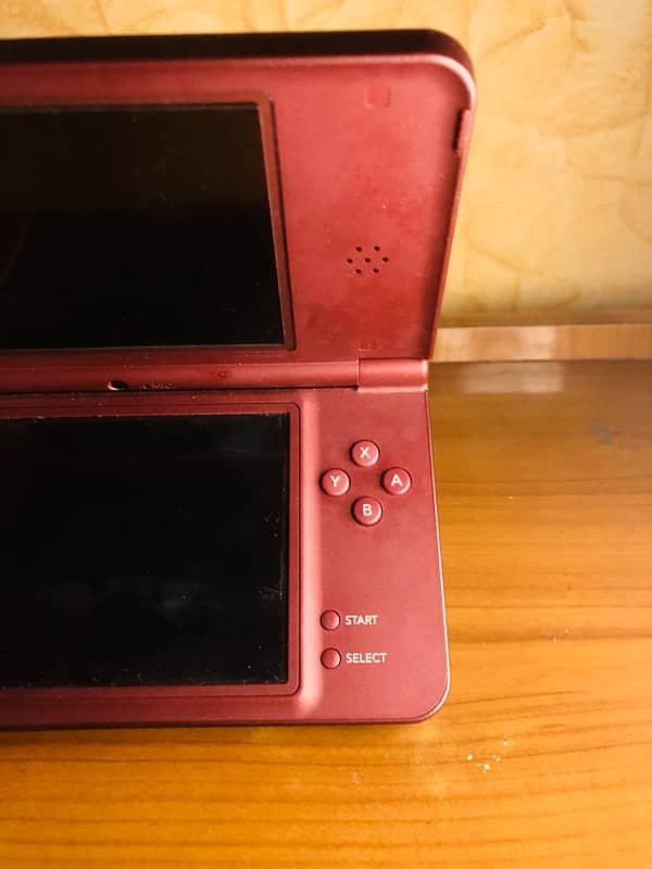 Nintendo DSi xl Mahroon colour 6