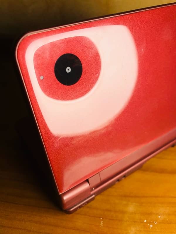 Nintendo DSi xl Mahroon colour 9