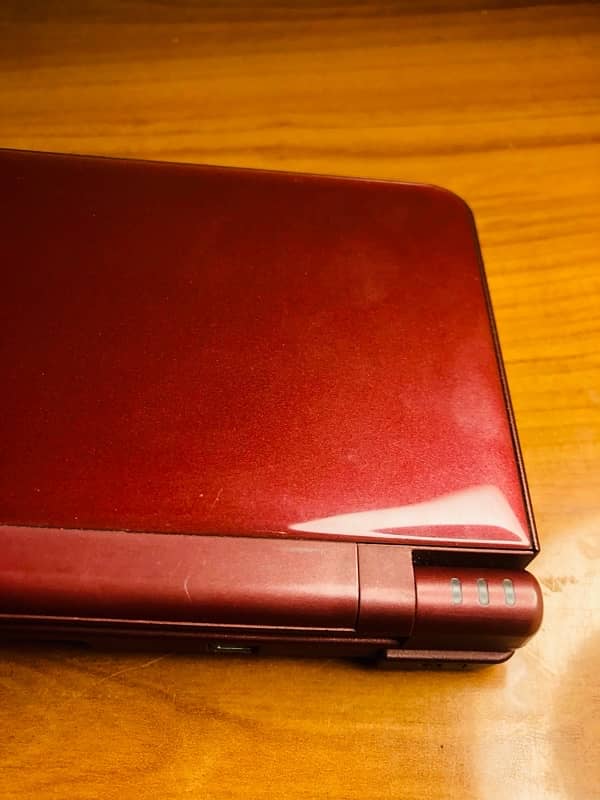 Nintendo DSi xl Mahroon colour 11