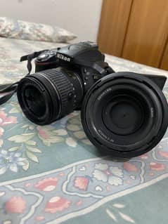 Nikon D5300 with 50 mm lense in perfect condition (barely used)