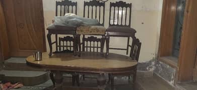 old dininig table with 6 chairs