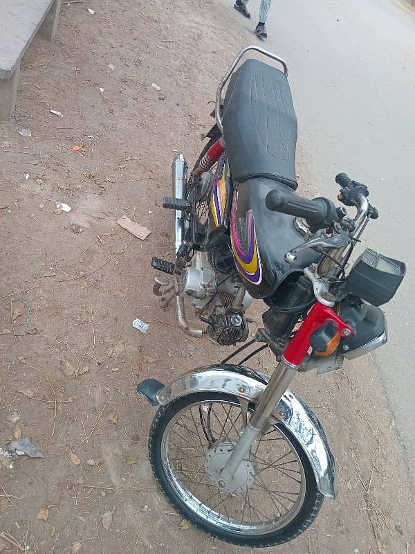 70 motorbike black colour in good condition 2