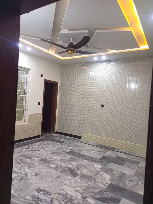 Double story house for rent. Location main paris city f block carpets road water electricity available 3